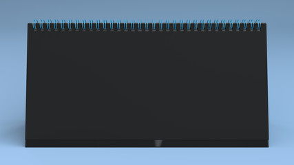 Black table calendar mock-up on blue surface