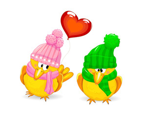 Little enamored birds. Birds dressed in winter knitted headdresses.                                                                                          