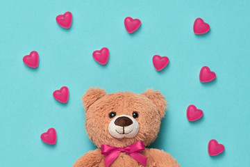 Valentines Day. Love. Teddy Bear with Candies Sweets Hearts. Minimal. Art. Cute bear on Pink hearts...