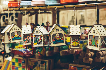 Wooden hand made Christmas decorations on a Christmas market in Krakow, Poland.