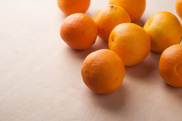 Fresh tangerines on wooden background,