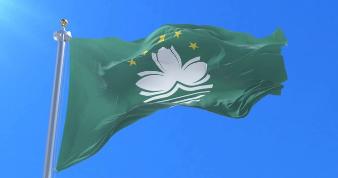 Macanese flag waving at wind with blue sky in slow, loop