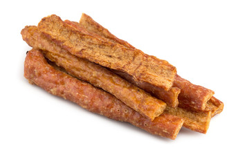 Pounded pork jerky, Dry pork pounding with meat tenderizer isolated on a white background