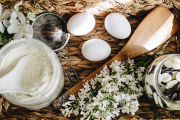 ingredients for cooking eggs, flour, chocolate in basket