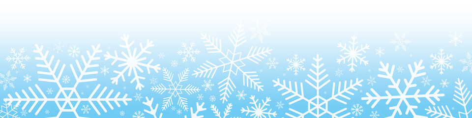 Snowflakes on blue gradient background.