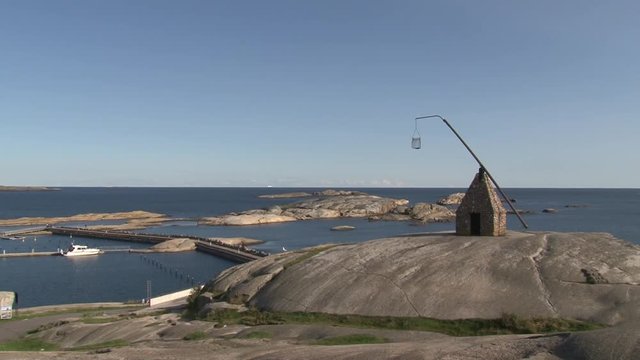 Norwegen, Norge, Verdens Ende, Oslofjord, Ende, Fjord, Insel, Tj&oslash;me, Vestfold, Skagerrak, Holmen, Sch&auml;ren, Felsen, Meer, Wippfeuer, Felsvorsprung, Mole, Hafen, Boot
