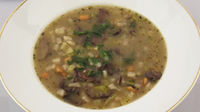 Soup with mushrooms and vegetables