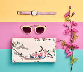 Fashion Woman Accessories Set. Pastel Color. Flat lay. Trendy fashion Floral Handbag Clutch, Glamour Sunglasses. Blossom Flower. Luxury Spring lady. Art Design. Minimal Style