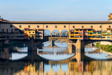 famous ponte vecchio bridge of florence on sunny day