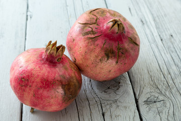 Pomegranate with cracks on the skin