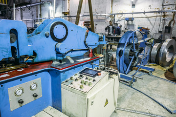 Metalwork factory workshop with modern electronic equipment tools