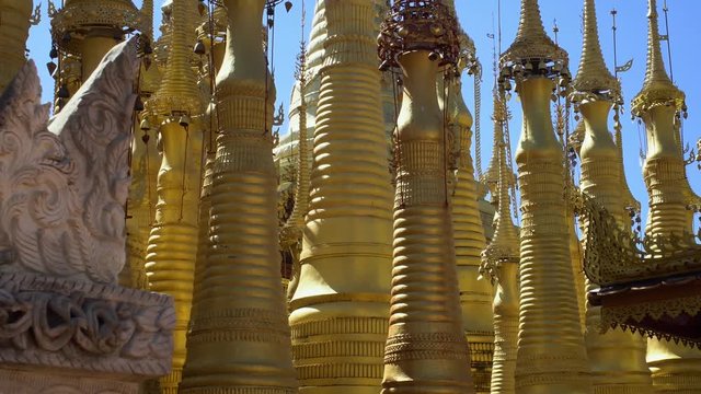 Spires of Burmese Golden Pagodas in Myanmar