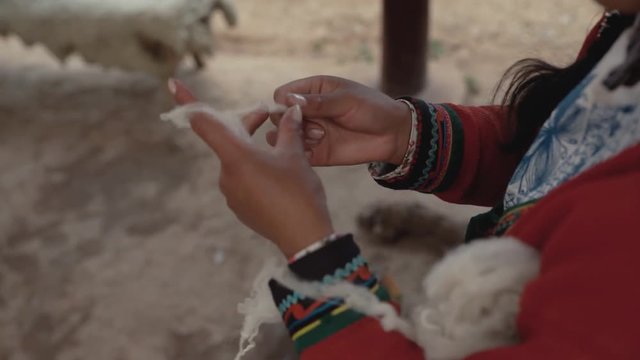 Woman make wool textile.Handmade traditional colorful wool. Peru woman make alpaca textile .