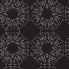 Seamless vintage decorative pattern with white circular geometric pattern on a black background. Hand drawing