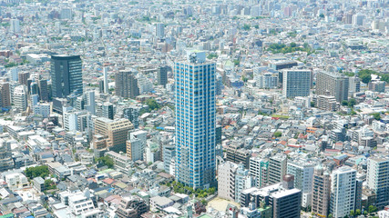 Fototapeta na wymiar The high commercial office and residential building in Japan downtown city 