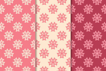 Set of red floral ornaments. Cherry pink vertical seamless patterns
