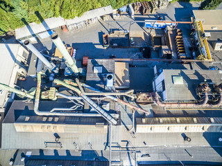 Aerial view of huge industrial chimneys
