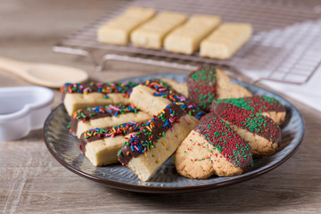 Chocolate dipped biscuits and shortbread on a plate