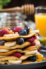 Healthy brunch with pancakes and juice.