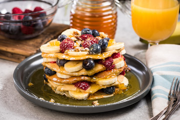 Healthy brunch with pancakes and juice.