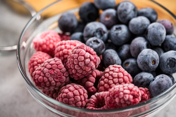Bowl with frozen berry fruits.