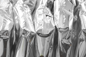 close up of snack package in aluminum foil arranging