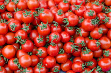 Organic Tomatoes background top view on market