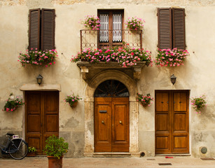 Facade of old house in Pienza