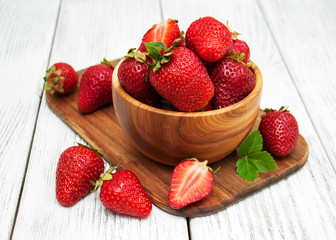 ripe strawberries on wooden table