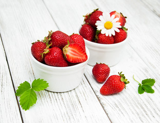 ripe strawberries on wooden table