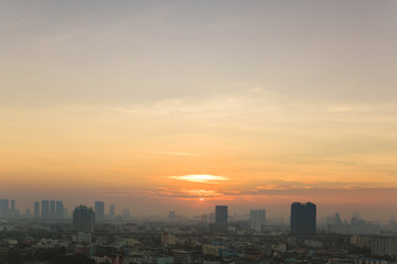 background of sun rise in the city at morning time