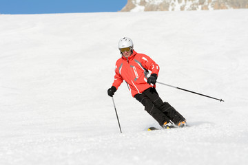 Fototapeta na wymiar Skier on the mountain slope in Dolomites, Italy, Europe.