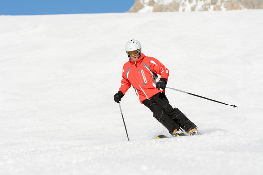Skier on the mountain slope in Dolomites, Italy, Europe.