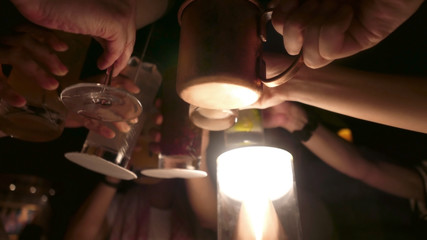 Good friends gathering at cheerful moment at night