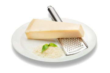 a piece of Parmesan and grated cheese on white background. Clipping path
