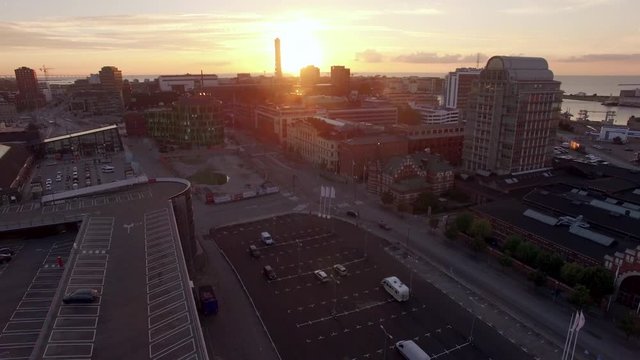 View of Malmö city at sunset. Aerial shot of buildings at dusk