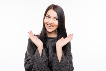 Amazed woman looking at camera isolated on a white