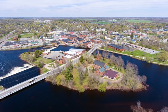 Village of Potsdam aerial view including Trinity Episcopal Church on an island in Raquette River, Upstate New York, USA.