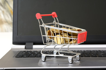 Buy Cryptocurrency concept with coins in shopping cart