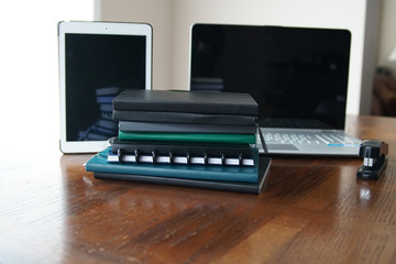 Notebook, Journal and Laptop  on Table