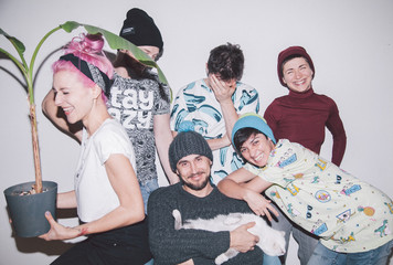 six friends celebrating new year at home