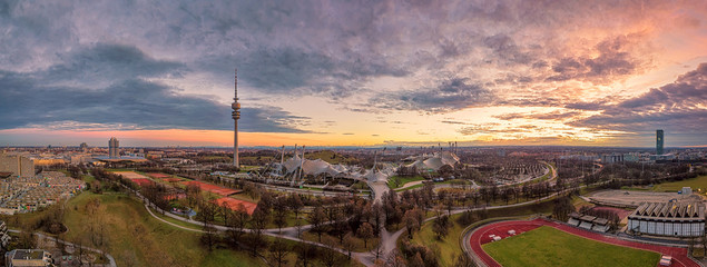 Der Olympiapark in München von oben als Luftbild bzw. Aerial zum Sonnenuntergang im Abendrot  AllesSuper © allessuper_1979