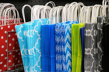 Colorful paper shopping bags in the retail store