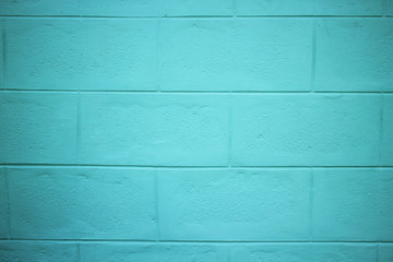Texture of mint color brick wall background
