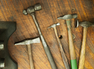 Antique Hammers on Table with Anvil