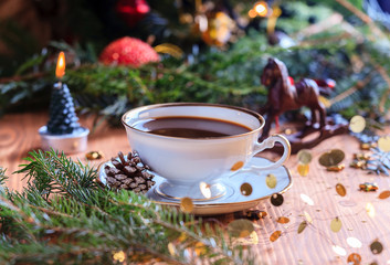 the coffee cup on wooden table