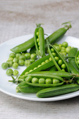 Pods of fresh green peas