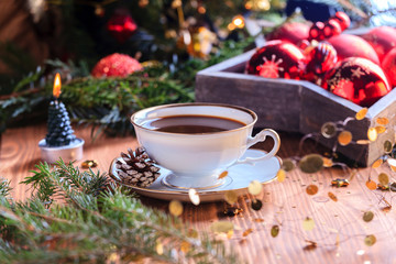 the coffee cup on wooden table