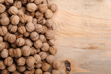 Walnut. Whole walnuts on wooden table. Natural and healthy food.