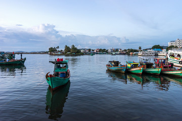 Duong Dong seaport. Fishing boats in water. Phu Quoc island. Vietnam